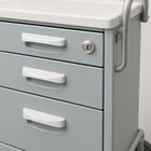 close up picture of drawers on a medical cart-1