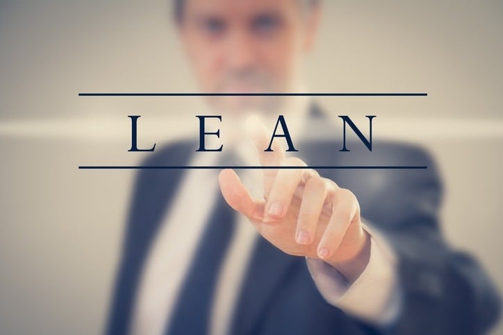 man pointing to the word lean