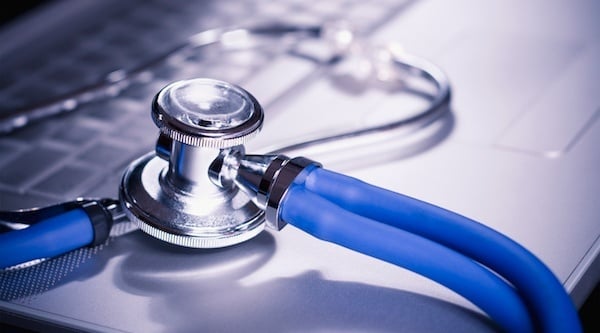 stethoscope on a laptop