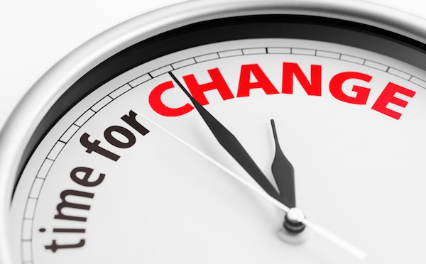 a clock with time for change on it